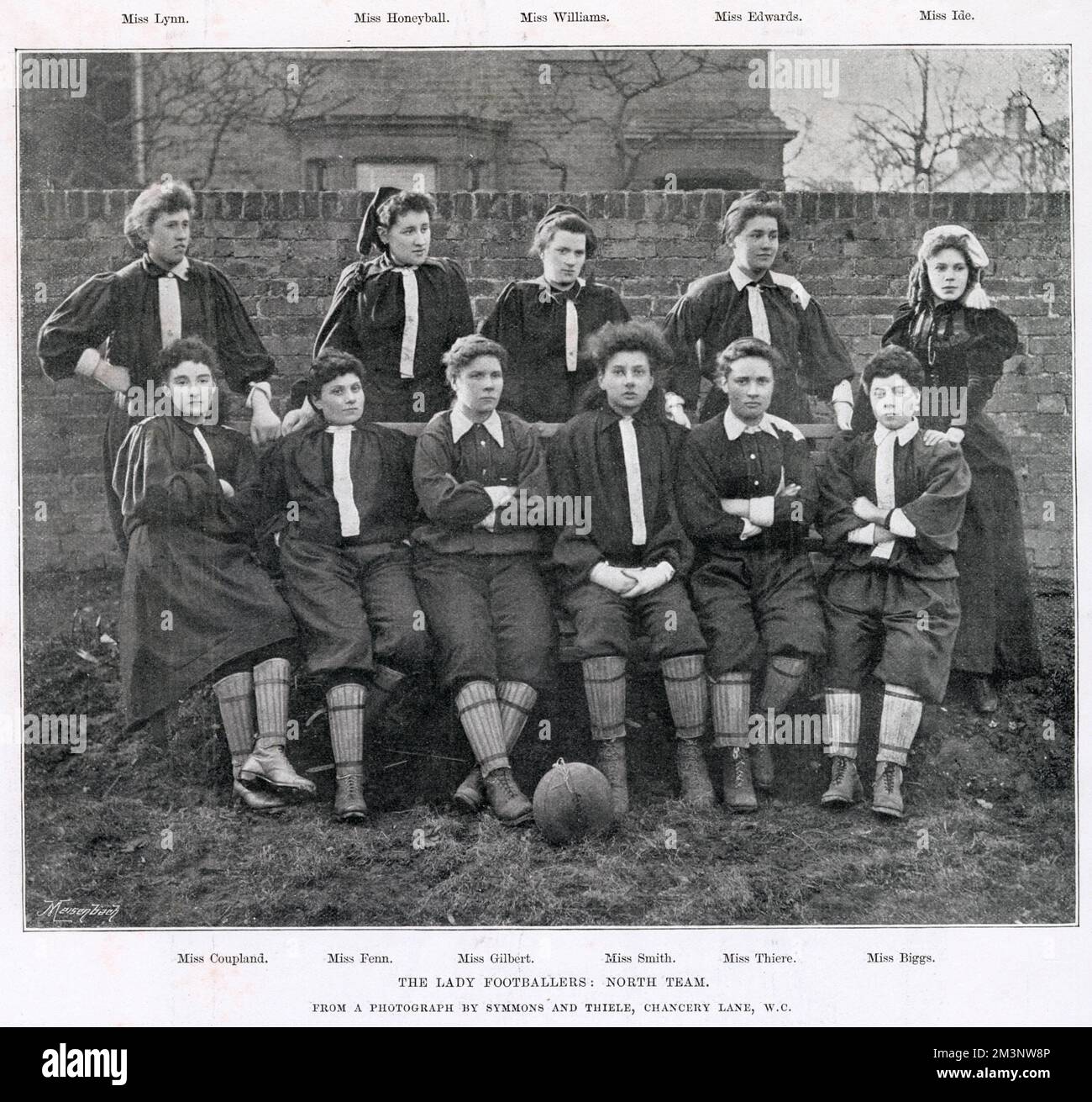 The North Team, representing North London, who played the opening match of the British Ladies Football Club to a crowd of 10,000 at Nightingale Lane Ground, Crouch End. Back row from left to right: Miss Lynn, Miss Nettie J. Honeyball(Captain), Miss Williams, Miss Edwards, Miss Ide. Front row from from left to right: Miss Coupland, Miss Fenn, Miss Gilbert, Miss Smith, Miss Thiere, Miss Biggs. Miss Ide appears in conventional attire, while the other ladies are dressed for the game. Stock Photo
