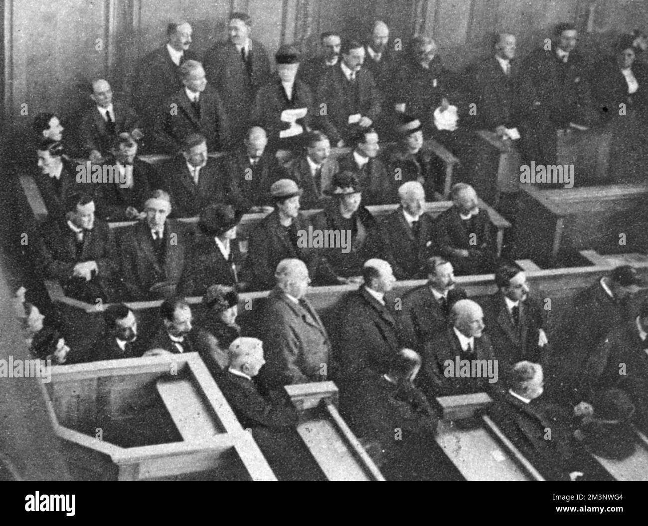 The first women jurors at the Central Criminal Court: a mixed jury waiting to be sworn in on 11th January 1921.     Date: 11th January 1921 Stock Photo