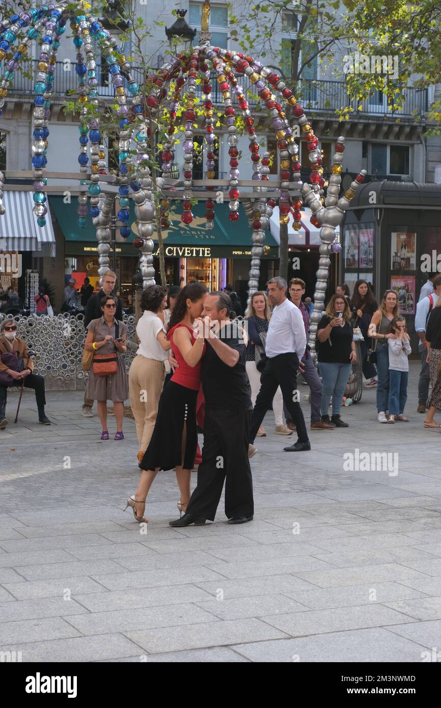 A vertical shot of a couple dancing salsa in Paris, France near the Louvre Stock Photo Alamy