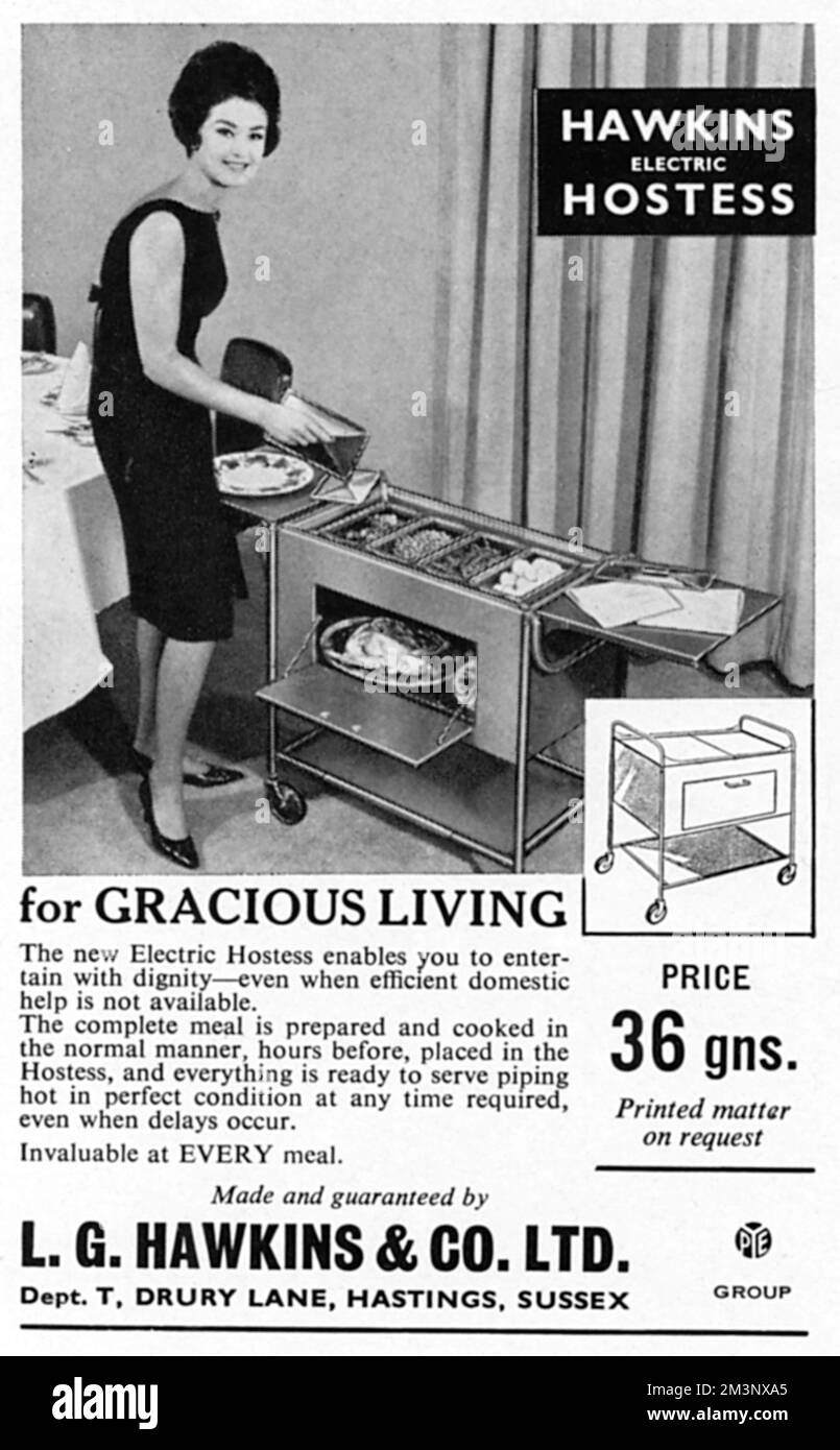 Advertisement for the Hawkins Electric Hostess Trolley 'for gracious living', enabling you to entertain with dignity 'even when domestic help is not available'!  An elegant hostess is pictured serving a pre-prepared meal to her guests from the trolley, where everything is kept warm for stress-free dinner party entertaining, sixties style!     Date: 1964 Stock Photo