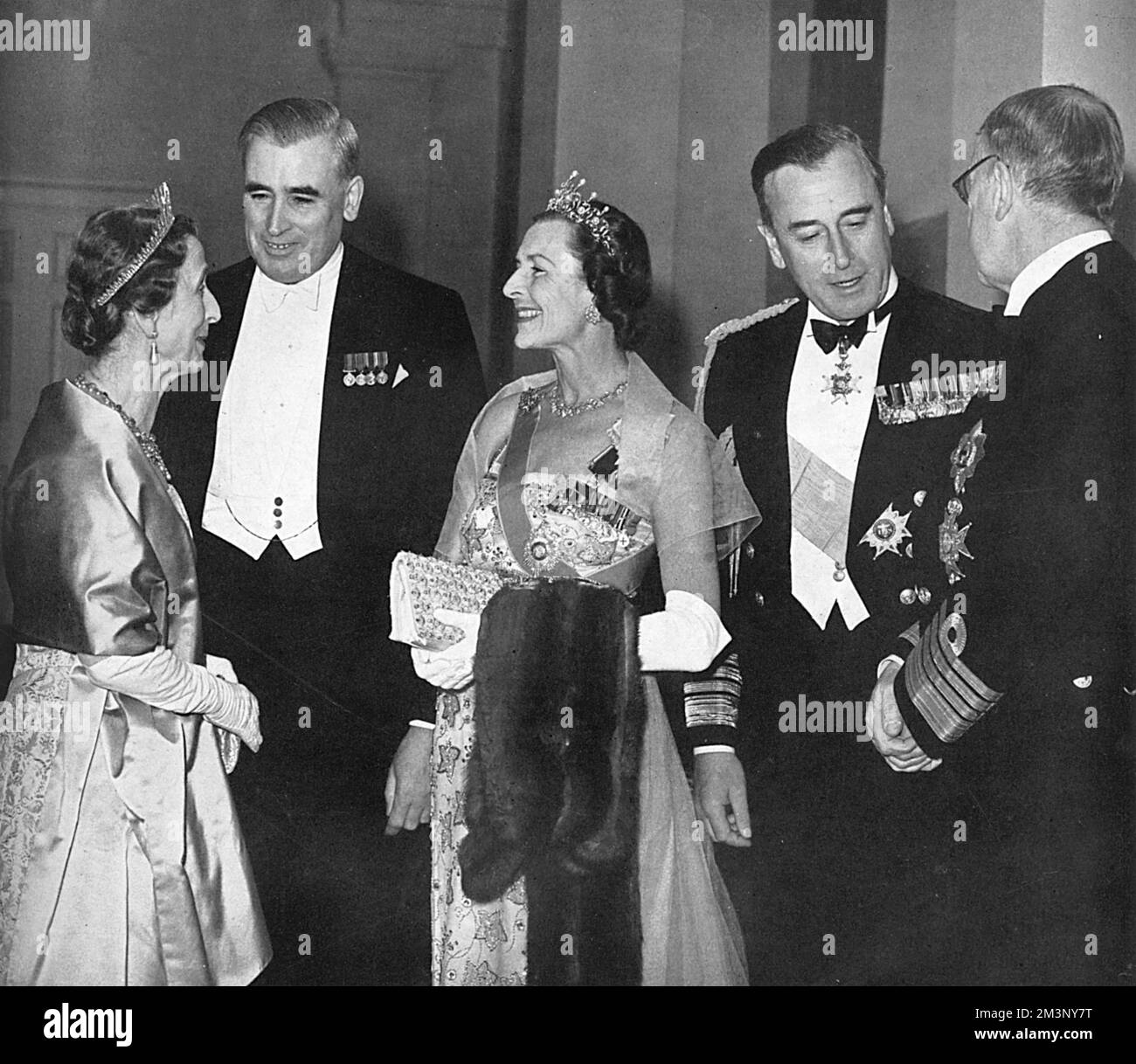 King Gustav VI of Sweden (1882 - 1973), pictured far right of the picture with his second wife, formerly Princess Louise of Battenberg, Lady Louise Mountbatten, being entertained by the Admiralty at a banquet at Greenwich at the Royal Naval College.  They are with Earl and Countess Mountbatten (the Earl was Queen Louise's brother) and the Rt. Hon. J. P. L. Thomas, First Lord of the Admiralty.       Date: 1955 Stock Photo