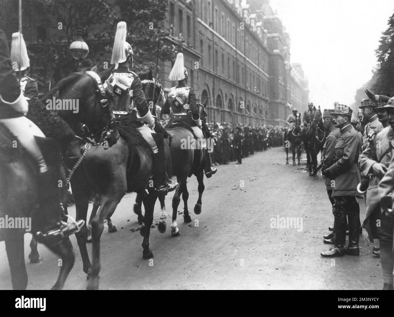 Marshal Foch and General Maxime Weygand, along with other French commanders and soldiers, watch the Household Cavalry pass along the Mall in London as part of the Victory parade Peace Day celebrations, 19th July 1919.     Date: 19th July 1919 Stock Photo