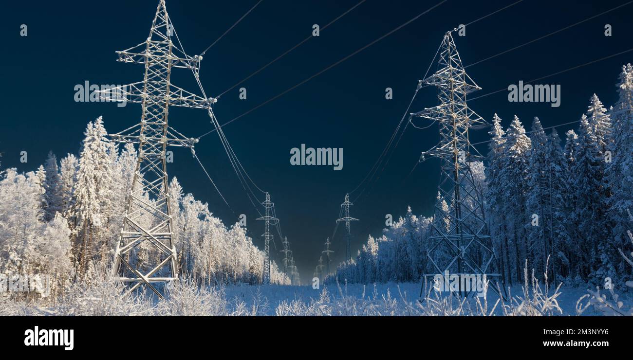 power poles in the snow, close-up photo. power lines in the snow. High quality photo. at night Stock Photo