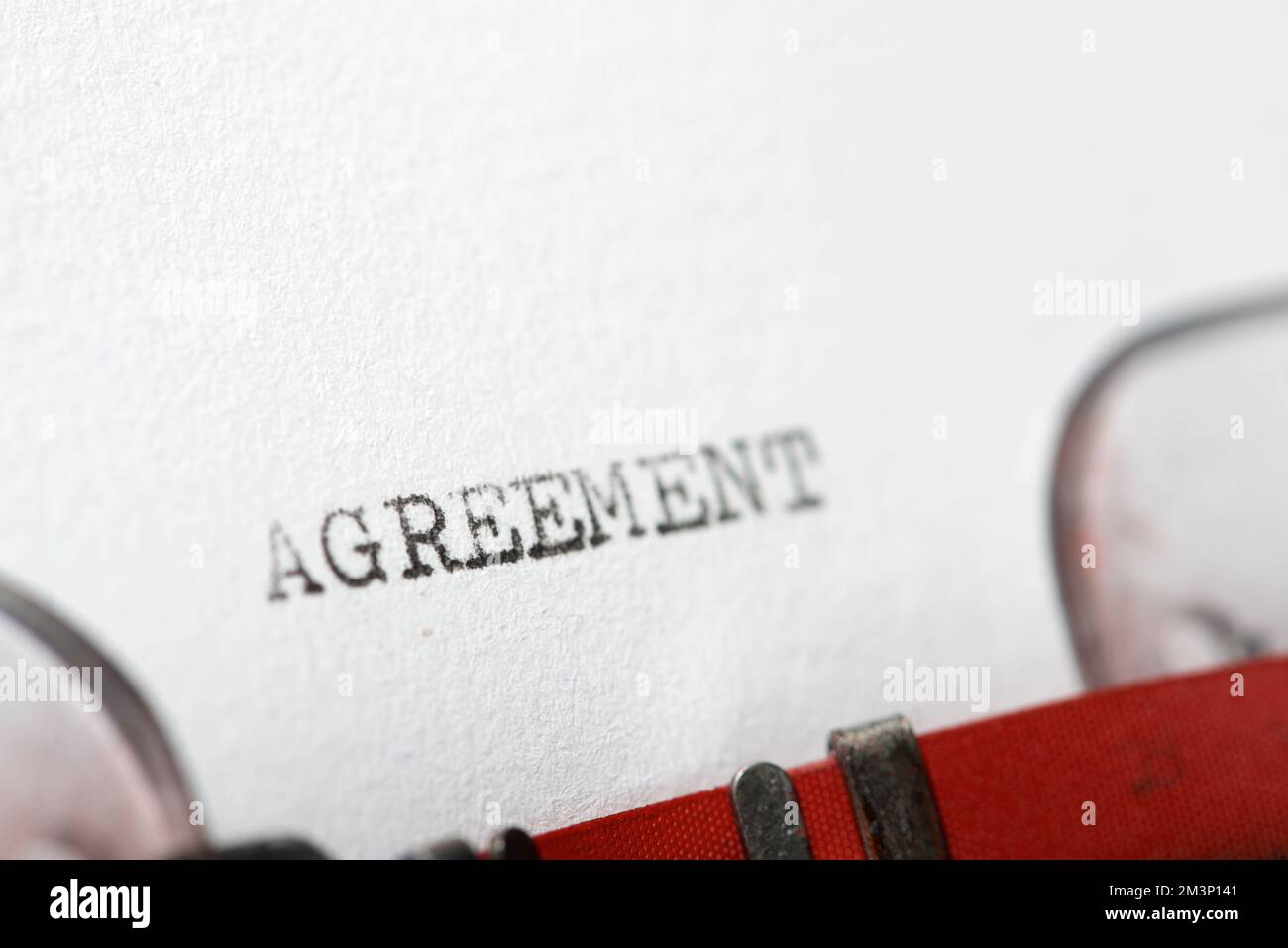 Agreement word written with a typewriter. Stock Photo