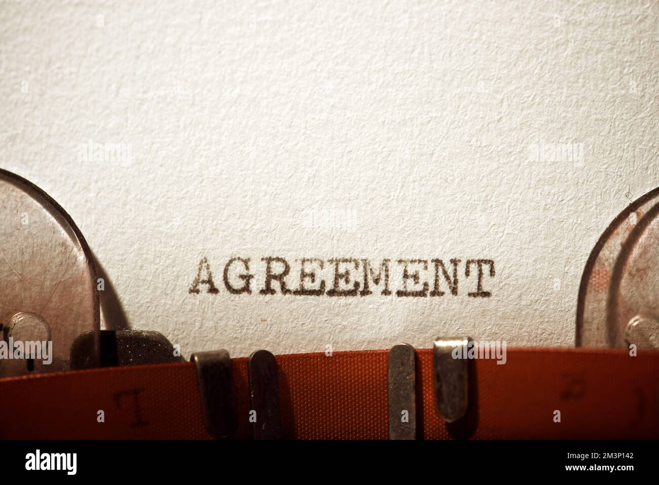Agreement word written with a typewriter. Stock Photo