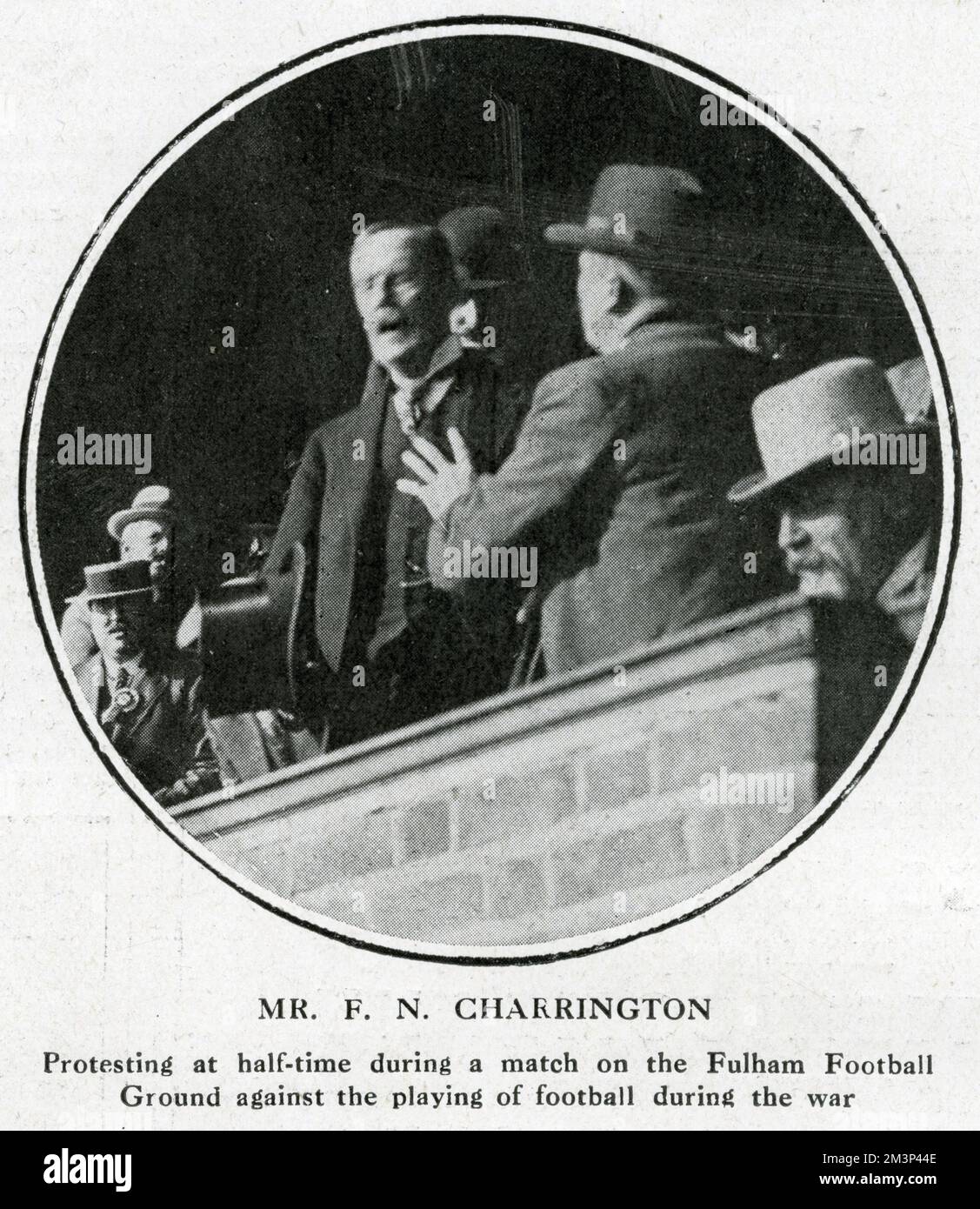 Frederick Nicholas Charrington (a member of the brewing family) protesting against the playing of football during the First World War.  He seized his opportunity during half-time at Fulham football ground.  He believed that it was cowardly for men to be paid to play football while other men were fighting on the Western Front -- professional players could only join the armed forces if their clubs agreed to cancel their contracts.      Date: September 1914 Stock Photo