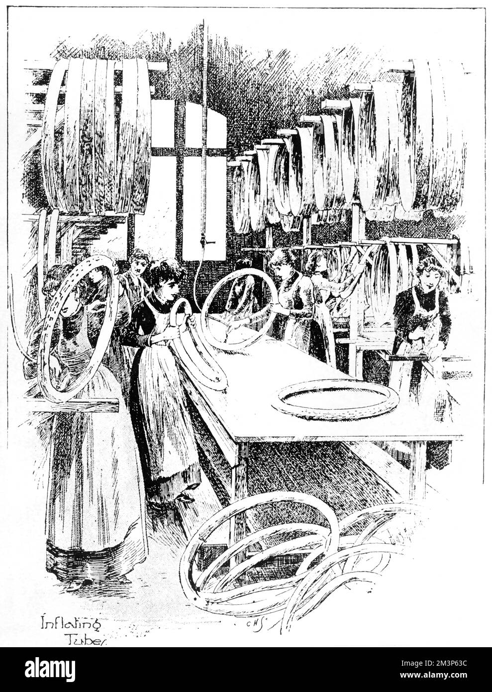 Manufacture of cycling accessories: women inflate the tubes of Dunlop tyres.  1896 Stock Photo