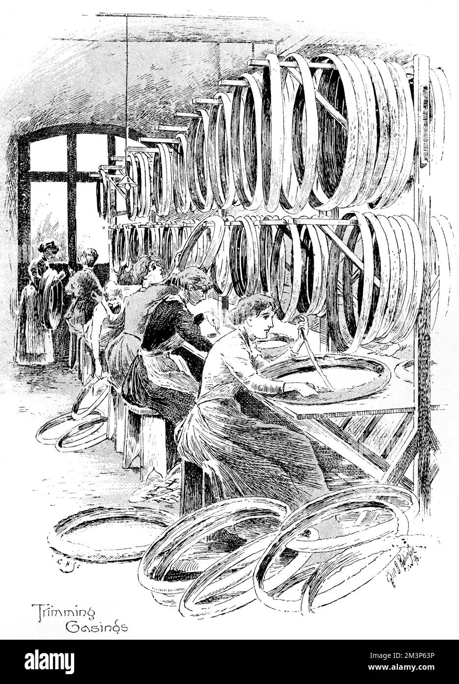 Manufacture of cycling accessories: women trimming the casings of Dunlop tyres.     Date: 1896 Stock Photo