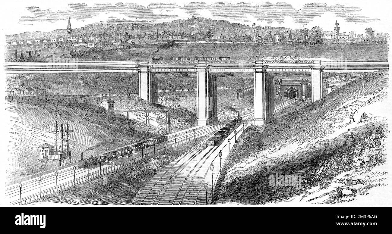 The viaduct of the Camden Town railway crossing the Direct York railway, as viewed from the bridge at the upper end of Maiden Lane, London in 1851. Copenhagen Fields can be seen on the horizon.  1851 Stock Photo