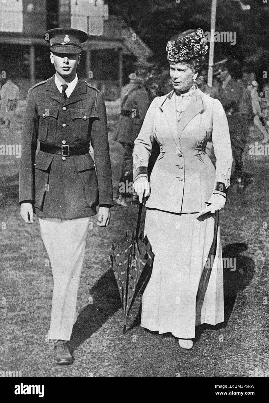 Queen Mary pictured with her third son, Prince Henry, later Duke of Gloucester at the Royal Military College, Camberley, Surrey where the latter was a cadet.       Date: 1918 Stock Photo