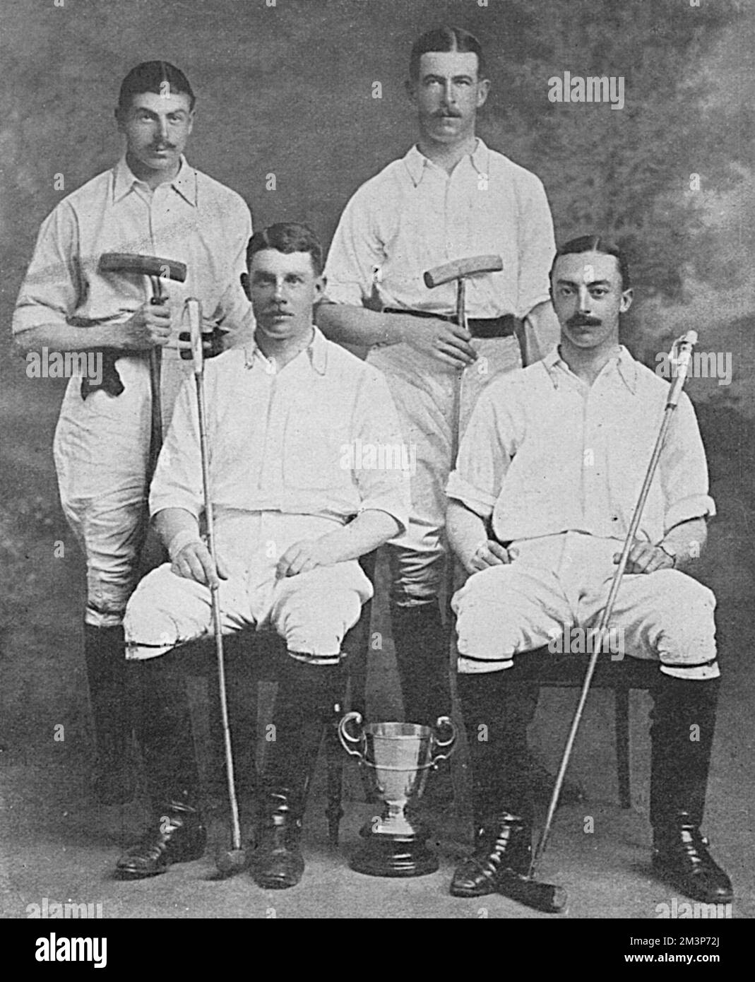 The 2nd Mounted Infantry Polo Team, formed in 1911 when stationed at Harrismith.  Three out of four were killed in action by 1915.  From left; Captain Day (killed), Captain Parker (killed), Captain Spencer Smith (badly wounded) and Captain Boxall (killed).       Date: 1915 Stock Photo