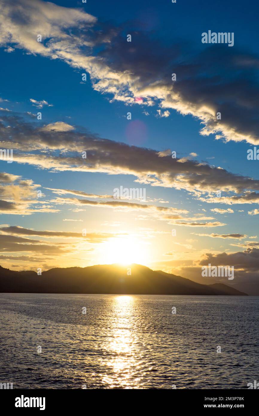 Sunrise over beautiful tropical island in the south Pacific in Papua ...