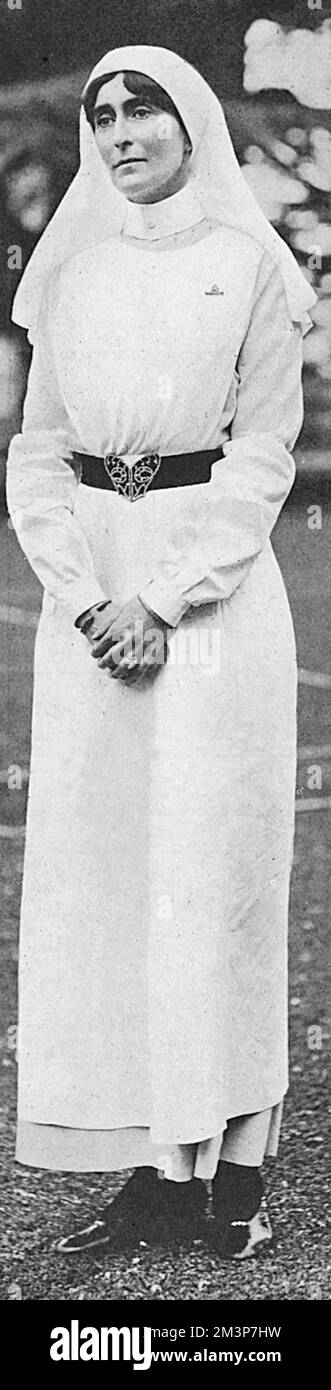 Lady Stradbroke, formerly Helena Fraser and wife of George Rous, 3rd Earl of Stradbroke, pictured in nurse's uniform at the family home of Henham Hall in Suffolk.  The house was converted into a military hospital during the First World War and received convoys of wounded soldiers directly from France, who were passed on to the Red Cross once sufficiently well.  Lady Stradbroke took sole charge as matron and efficiently superintended the hospital.  Henham Hall was demolished in 1953.       Date: 1916 Stock Photo