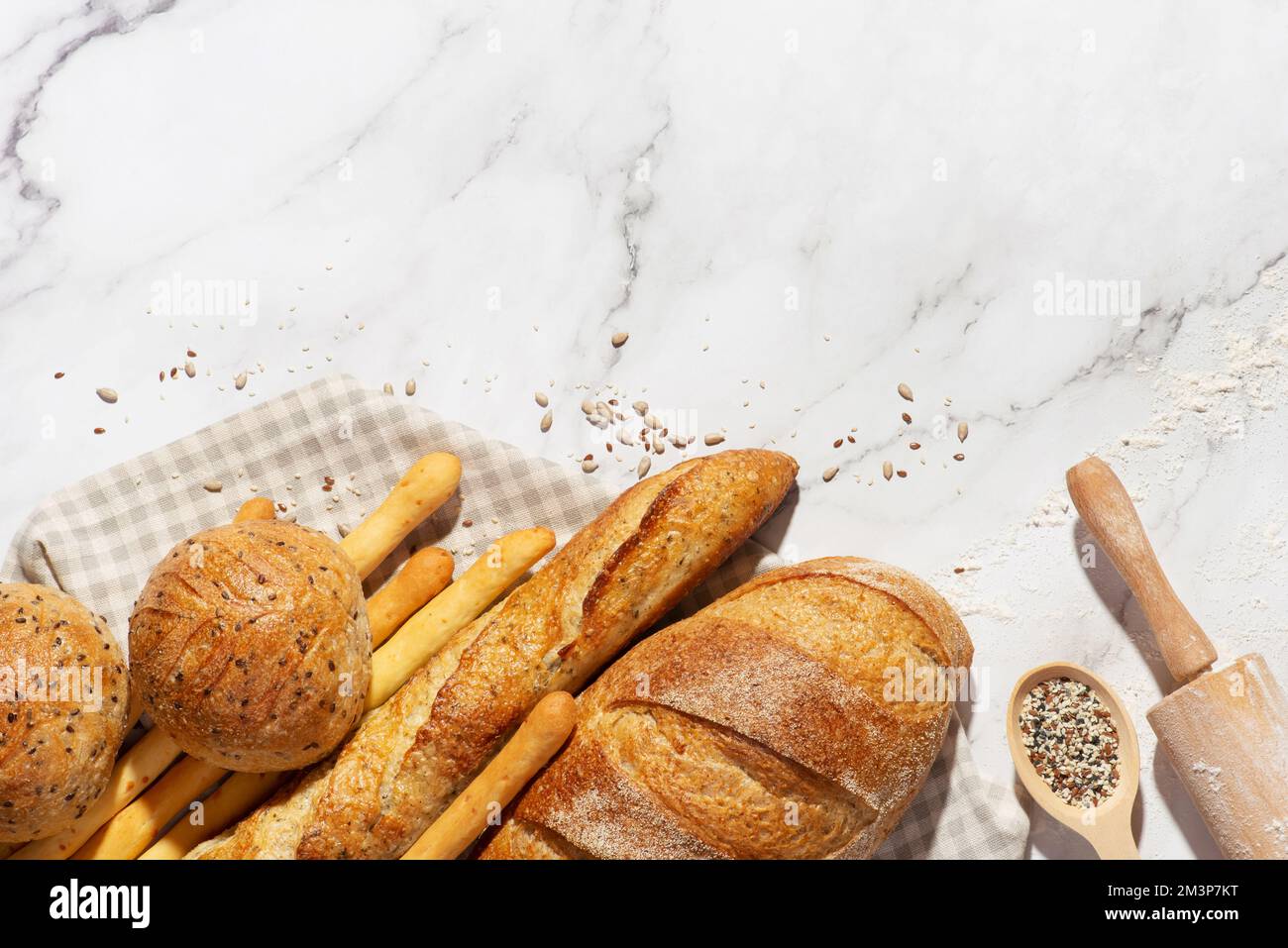 Background with different types of fresh bread. Bakery products. Cooking. Stock Photo