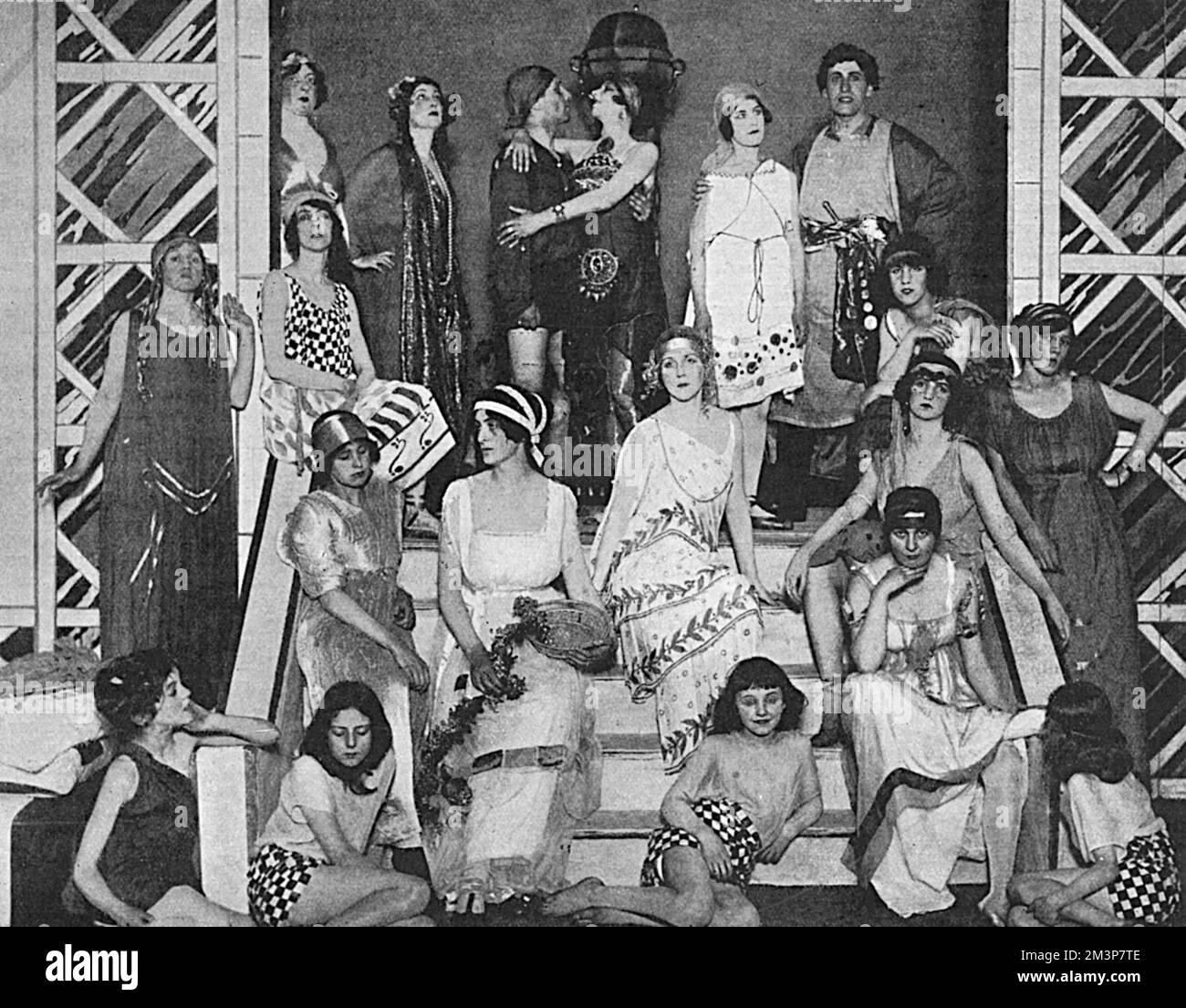 A group at Lena Ashwell's special matinee at the Lyric Theatre on 29 June 1917, in aid of the Concerts at the Front Fund.  A number of society ladies took part and the scene depicted shows the Swinburne Ballet which was a special feature of the entertainment.  In the centre is Lady Diana Manners, later Lady Duff Cooper.  Numerous matinee performances such as this were organised and acted out by society ladies during the First World War.       Date: 1917 Stock Photo