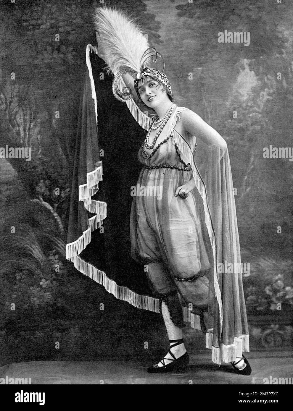 Gaby Deslys (1884 - 1920), French actress, music hall artiste and sometime lover of King Manuel II of Portugal, pictured in 1914 when she was appearing in 'The Passing Show,' at the Palace Theatre.  When war broke out, Gaby was in Ostend but managed to make her way to England.     Date: 1914 Stock Photo