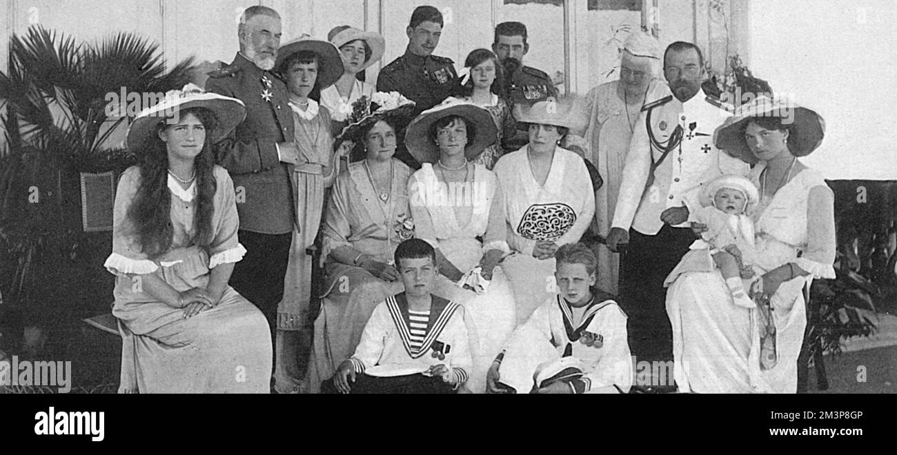 The Russian and Romanian royal families, pictured during the former's visit to Constanza, on the Romanian coast. From left, going around the back: Grand Duchess Maria of Russia, Carol I, King of Romania, Grand Duchess Anastasia of Russia, Princess Marie of Romania, Prince Carol of Romania, Crown Prince Ferdinand of Romania, Queen Elizabeth of Romania, Czar Nicholas II, Grand Duchess Tatiana of Russia with the baby Prince Mircia of Romania. Seated in the centre are the Czarina of Russia, Grand Duchess Olga of Russia, Princess Ileana of Romania, Crown Princess of Romania. Sitting at the front a Stock Photo