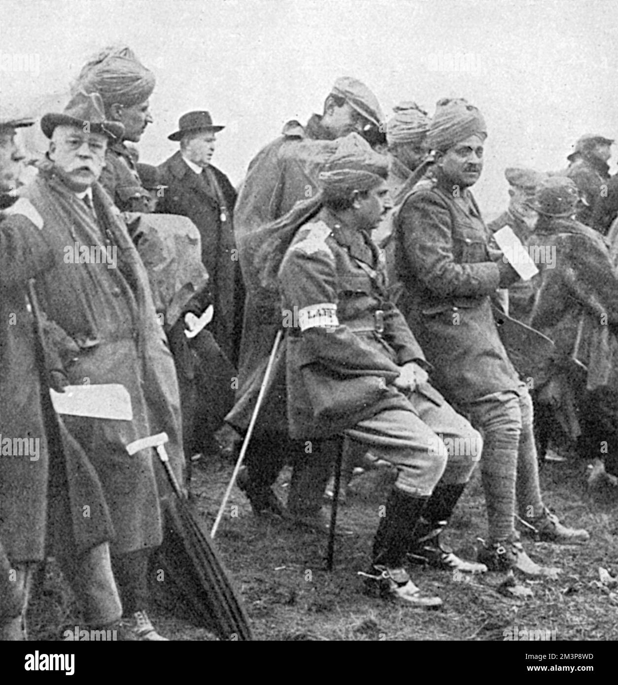 From the Front in France to see the coursing for the Waterloo Cup.  Two Indian officers, among a number of men who had managed to put in an appearance at Altcar for the coursing competition, the Waterloo Cup.  They are Captain Mohammed Hayat Khan (King George's Own) and Lieutenant Mumtaz Mohammed Khan of the 9th (Secunderabad) Cavalry Brigade.        Date: 1915 Stock Photo