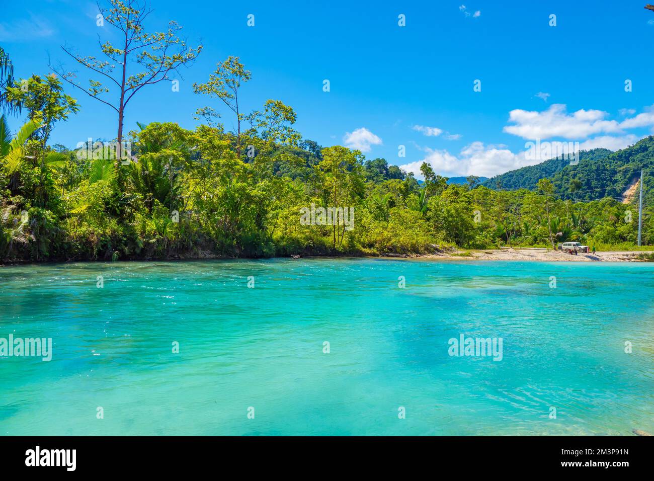 Pristine colorful turquoise water in the crystal river in papua New