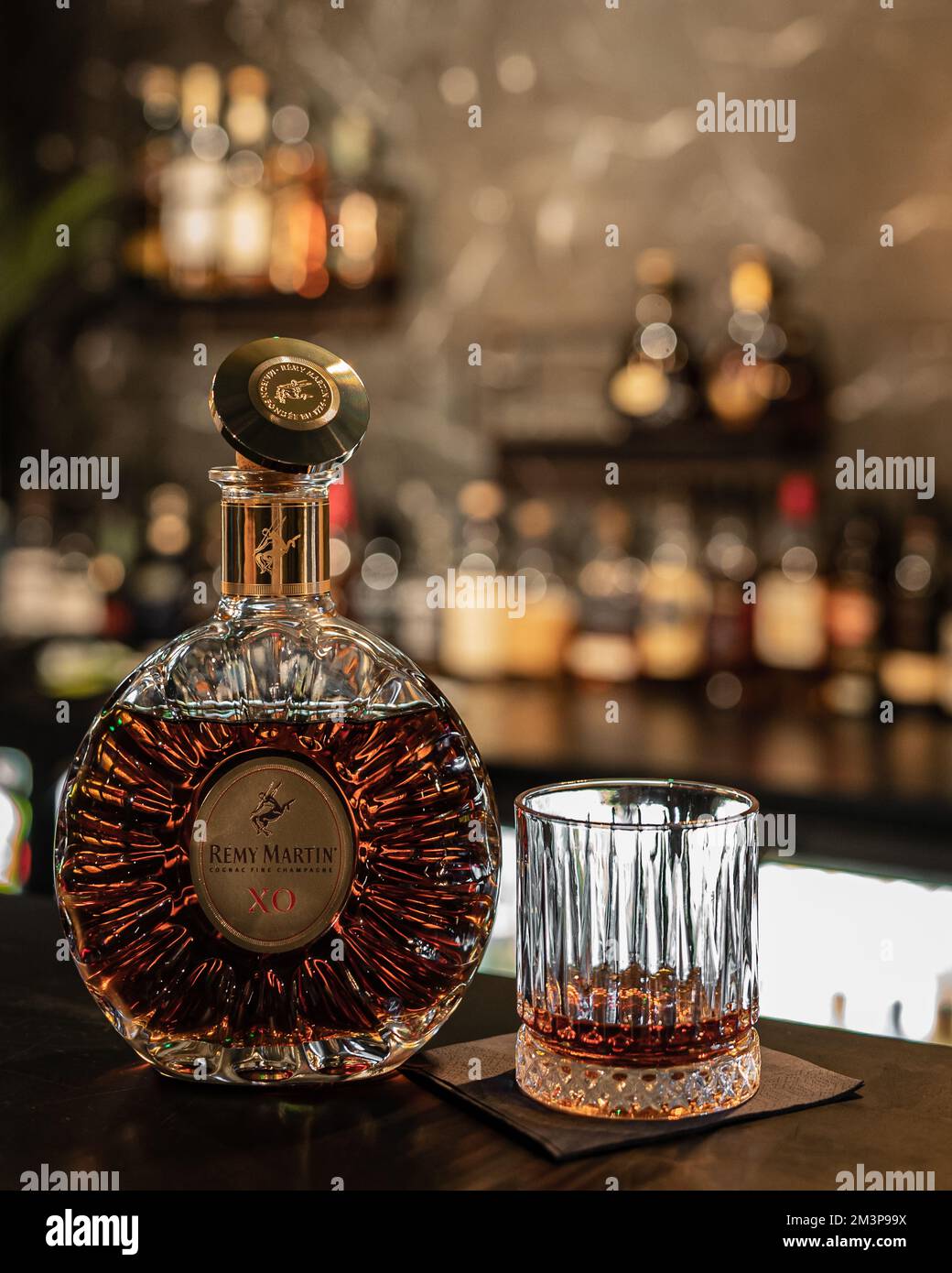 An elegant bottle of Remy Martin XO at the bar Stock Photo Alamy