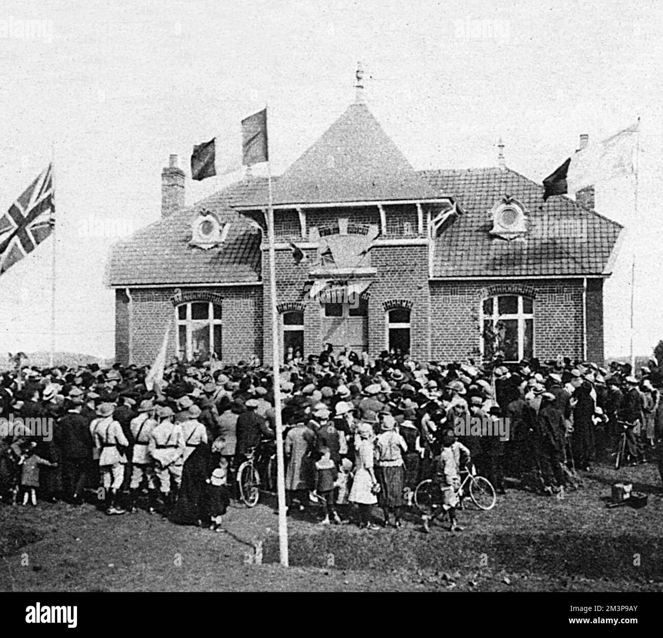 Liverpool's gift to its adopted French town : the new memorial hall at Givenchy after the opening ceremony performed by the Lord Mayor of Liverpool. Part of the British League of Help's 'adoption' of French towns by British ones to help rebuild devastated areas of France after the First World War.     Date: 1924 Stock Photo