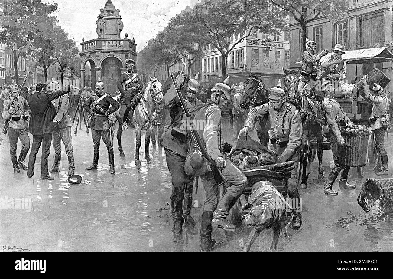 German soldiers in the Place du March&#x9b20;Li&#x89e5;. To the left a Belgian man is being searched, and on the right the troops are availing themselves of the local market produce.     Date: August 1914 Stock Photo