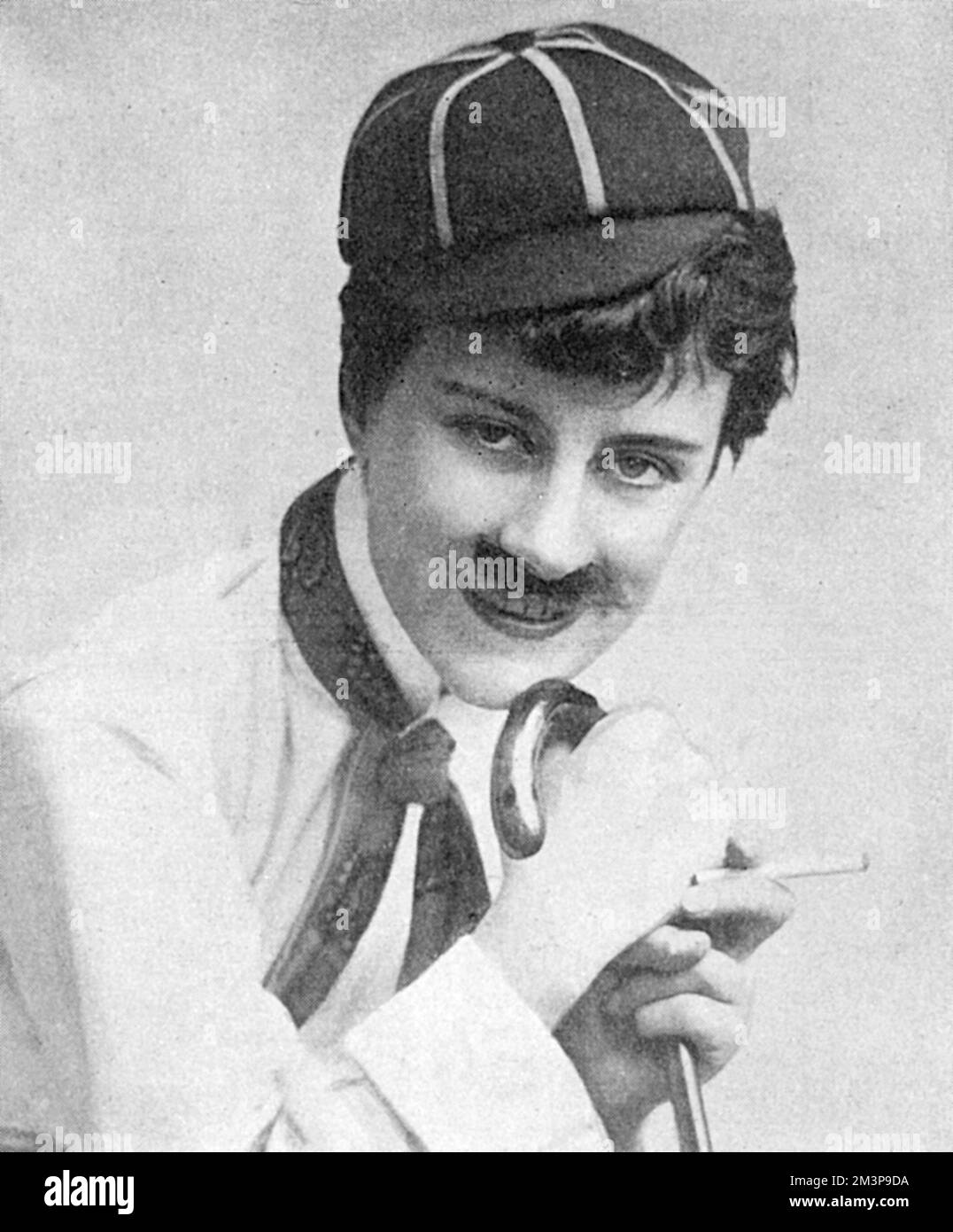 Beatrice Lillie (1894 - 1989) British actress, later Lady Peel after she married Robert ('Bobbie') Peel, who succeeded to his father's baronetcy in 1925.  Pictured early in her career dressed up as Charlie Chaplin, the 'Cinema King' in the new Vaudeville revue, Tabs.     Date: 1918 Stock Photo