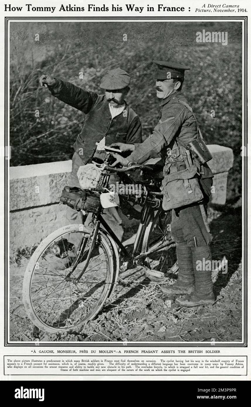 How Tommy Atkins finds his way in France. A British soldier with a bicycle, lost in the windmill country of France, receives directions from a French peasant in November 1914 in the First World War. Stock Photo