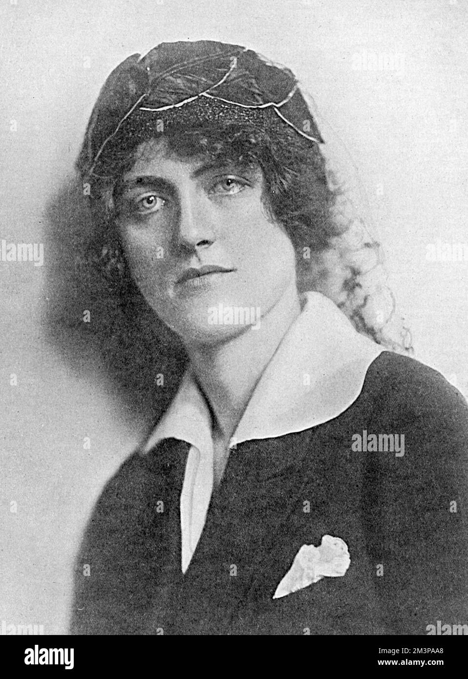 Lady Catherine (Kitty) Petre, formerly Catherine Margaret Boscawen, wife of Lionel Goerge Carroll, 16th Baron Petre. The 16th Baron, son of the 15th Baron and Julia Mary Cavendish-Taylor. He was born 3rd November 1890 and became a Captain in the Coldstream Guards. He was wounded near Arras in the late Spring of 1915, was repatriated and died of his wounds in September leaving two children, one born posthumously. Lady Petre subsequently remarried and became Lady Rasch. She was responsible for the restoration of the Petre family seat, Ingatestone Hall, in Essex.      Date: 1918 Stock Photo