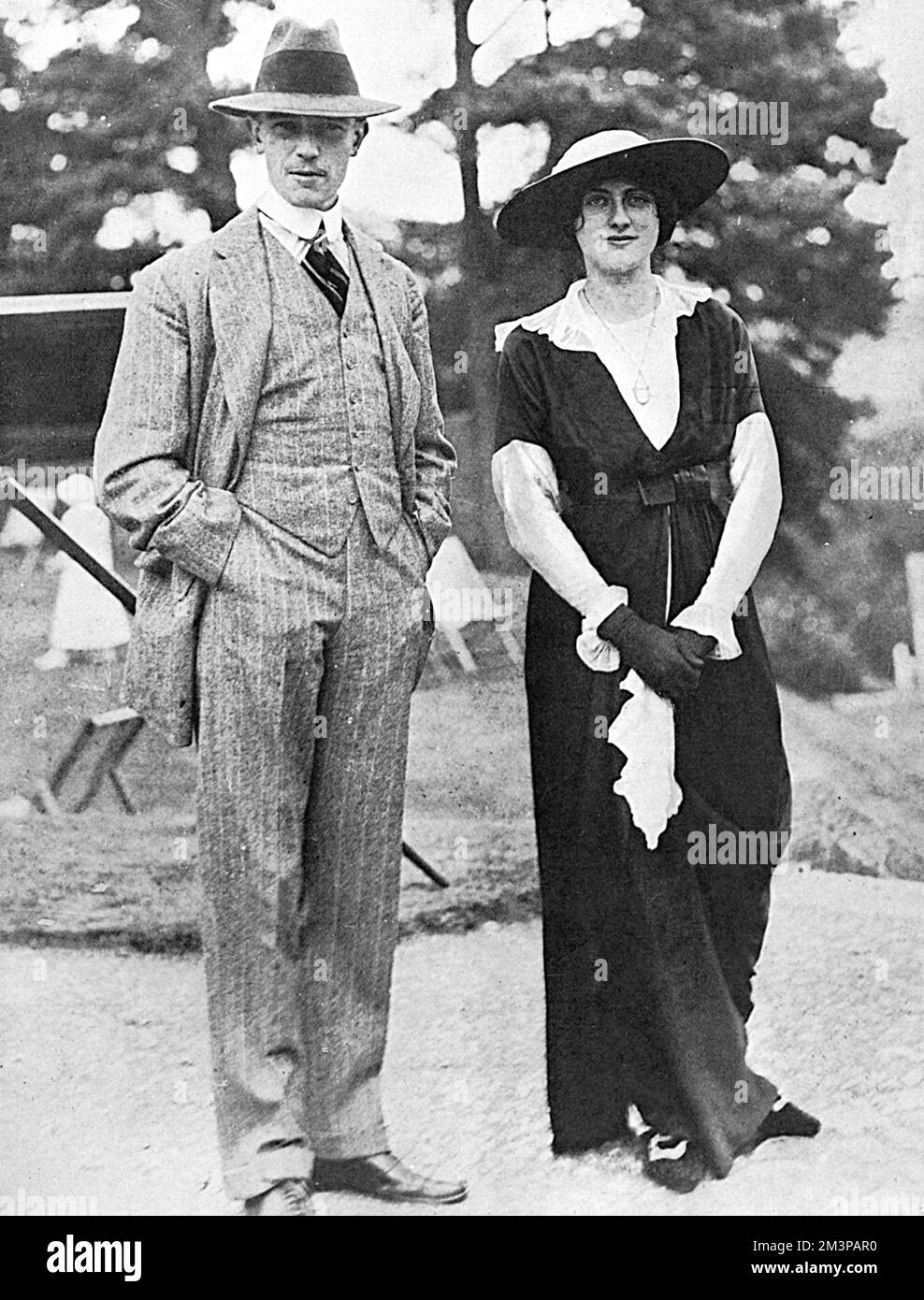 Lord and Lady Petre pictured at Tregye, Perranwell, Cornwall shortly after returning from their honeymoon.  Lady Catherine (Kitty) Petre, was formerly Catherine Margaret Boscawen and married Lionel George Carroll, 16th Baron Petre in 1913. Lionel was the 16th Baron, son of the 15th Baron and Julia Mary Cavendish-Taylor. He was born 3rd November 1890 and became a Captain in the Coldstream Guards. He was wounded near Arras in the late Spring of 1915, was repatriated and died of his wounds in September leaving two children, one born posthumously. Lady Petre subsequently remarried and became Lady Stock Photo