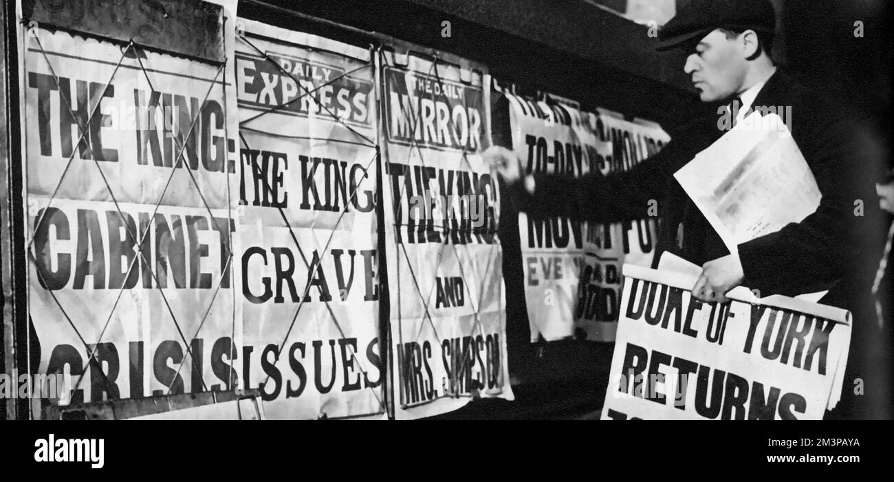 Newspaper posters reporting on the impending constitutional crisis, 3rd December 1936. In early December 1936, a constitutional crisis in the British Empire arose when Edward VIII proposed to marry Wallis Simpson, an American socialite who was divorced from her first husband and was pursuing the divorce of her second. The marriage was opposed by the governments of the United Kingdom and the Dominions of the British Commonwealth. Stock Photo