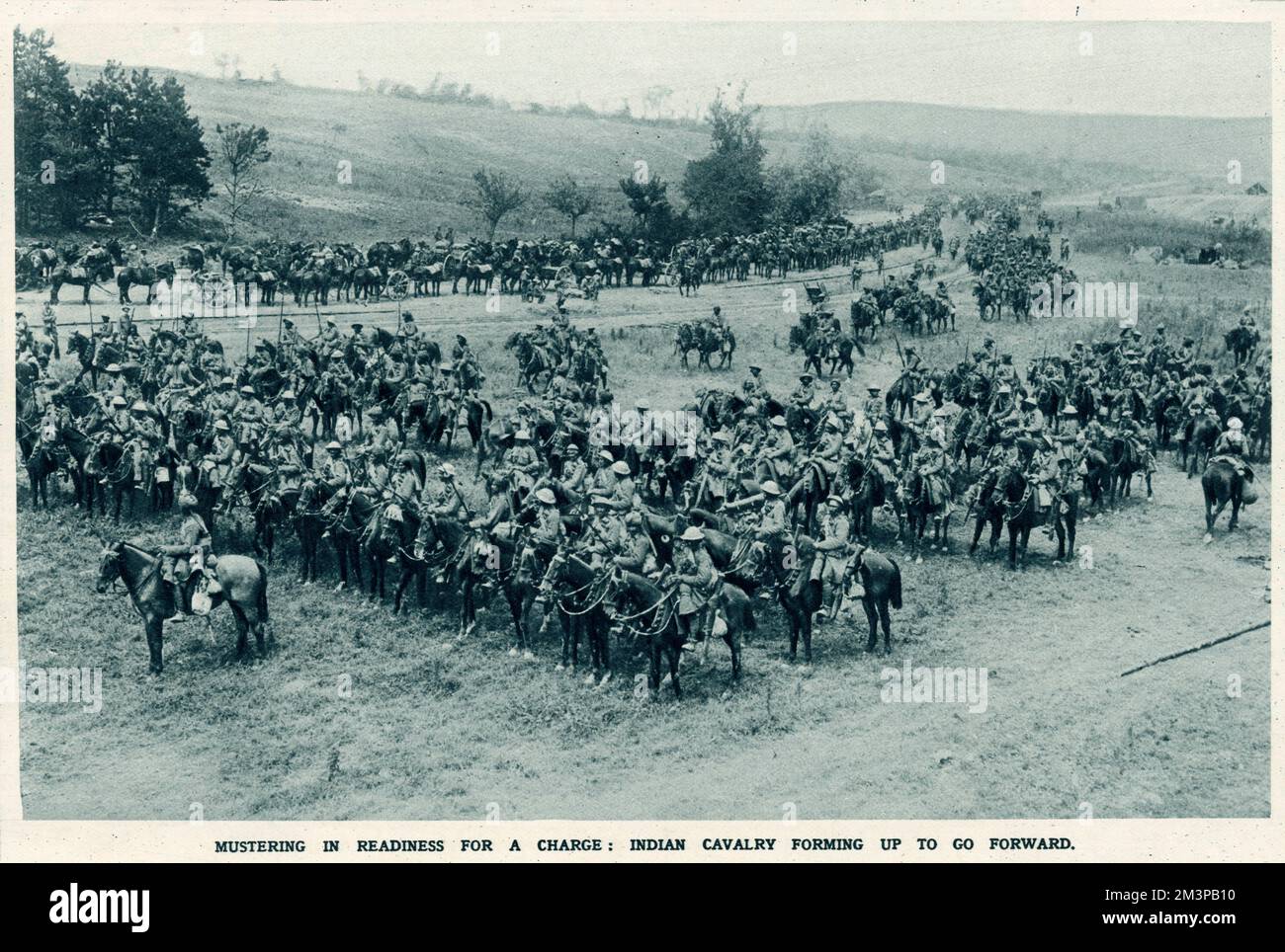 A troop of Dragoon guards in company with Indian cavalry prepare for a cavalry charge across the German Third Line in the Wood of Foureaux of Bazentin-le-Grand.      Date: 1916 Stock Photo