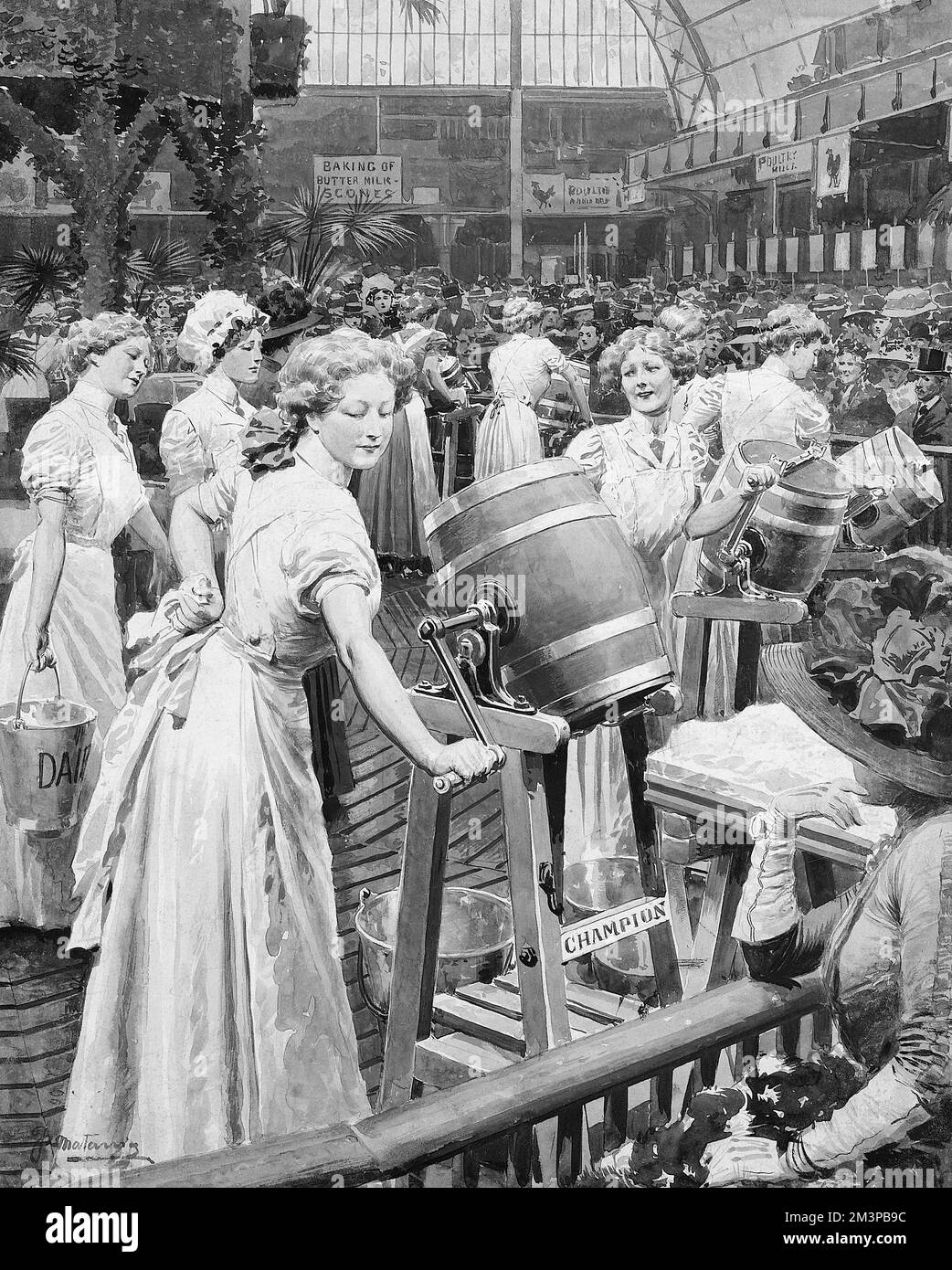 Women churning buttermilk at a trade exhibition. Stock Photo