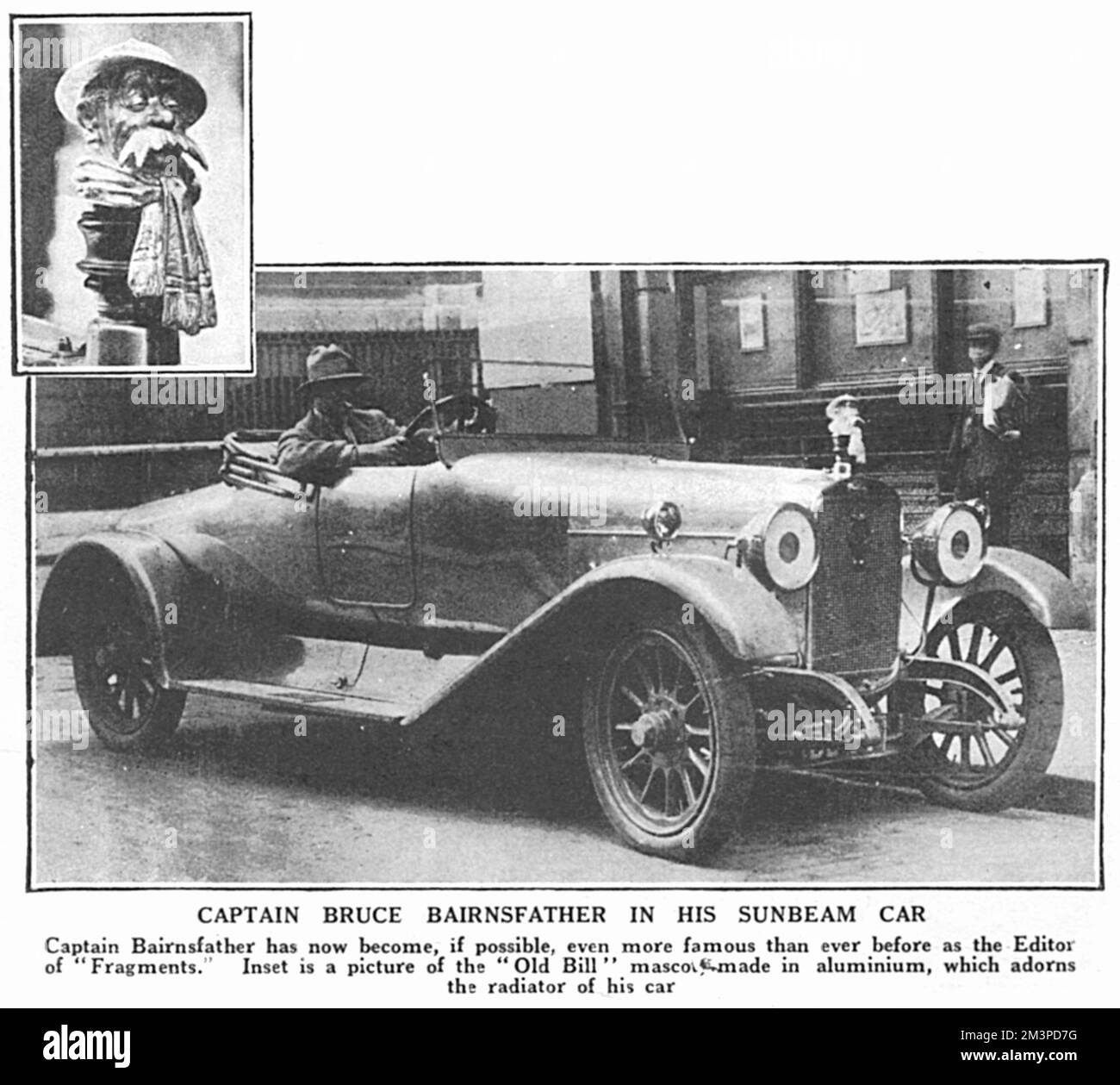 Captain Bruce Bairnsfather, famous for his cartoons of trench humour in The Bystander during the First World War seen at the wheel of his Sunbeam car with an aluminium car mascot in the shape of the character, 'Old Bill,' his most famous creation.  He would be charged for speeding in London the following year in the car.     Date: 1919 Stock Photo