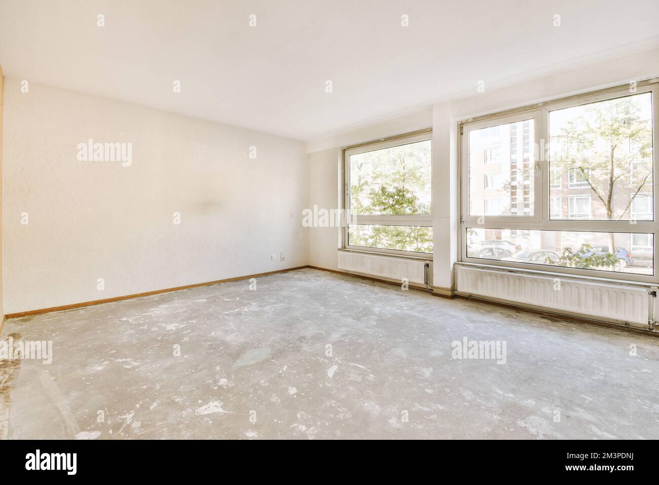 an empty living room with no furniture or people in the room, but it is