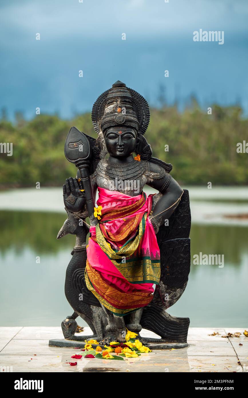 Grand bassin is a relegious place for meditation, pray and relax. Famous touristical destination in Mauritius island.  More hidu gods statue in this p Stock Photo