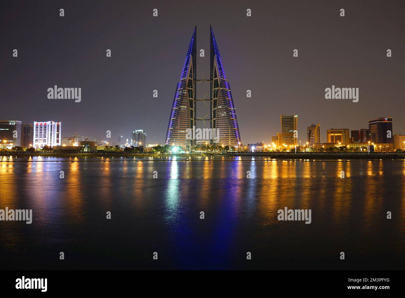 The sail-shaped towers and wind turbines of Bahrain WTC towers signify the maritime history of Manama, Bahrain, Middle East Stock Photo