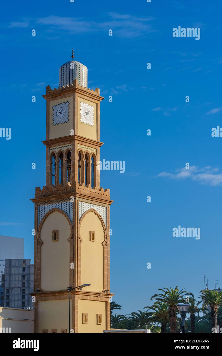 Casablanca Clock Tower in French Tour de l'Horloge against blue sky Stock Photo