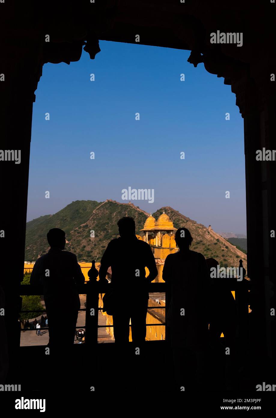 Tourists silhouettes in Amber Fort, Rajasthan, Amer, India Stock Photo