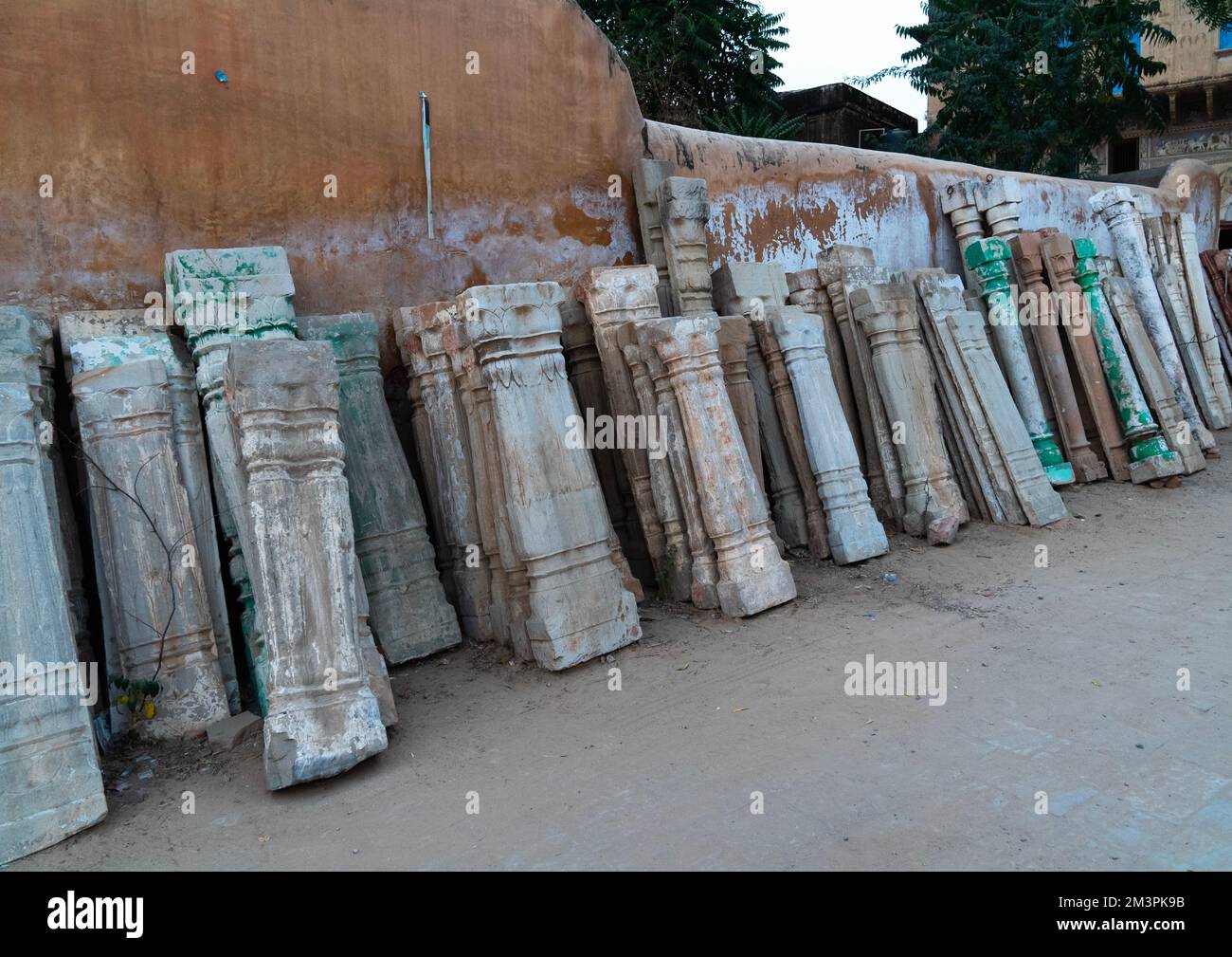 Antique stone pillars for sale in a shop, Rajasthan, Mandawa, India Stock Photo