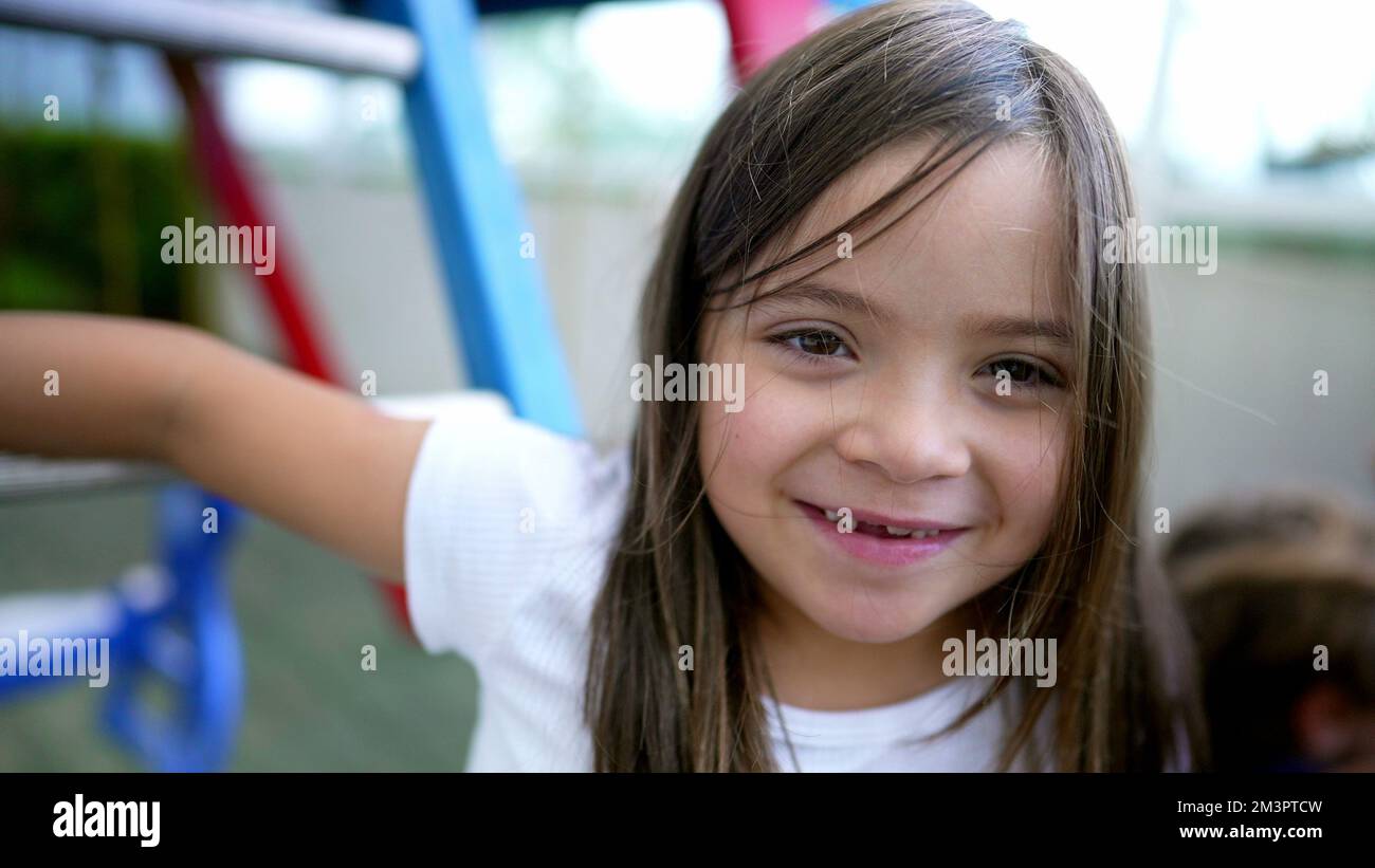 Child showing missing teeth portrait little girl teeth grow Stock Photo Alamy