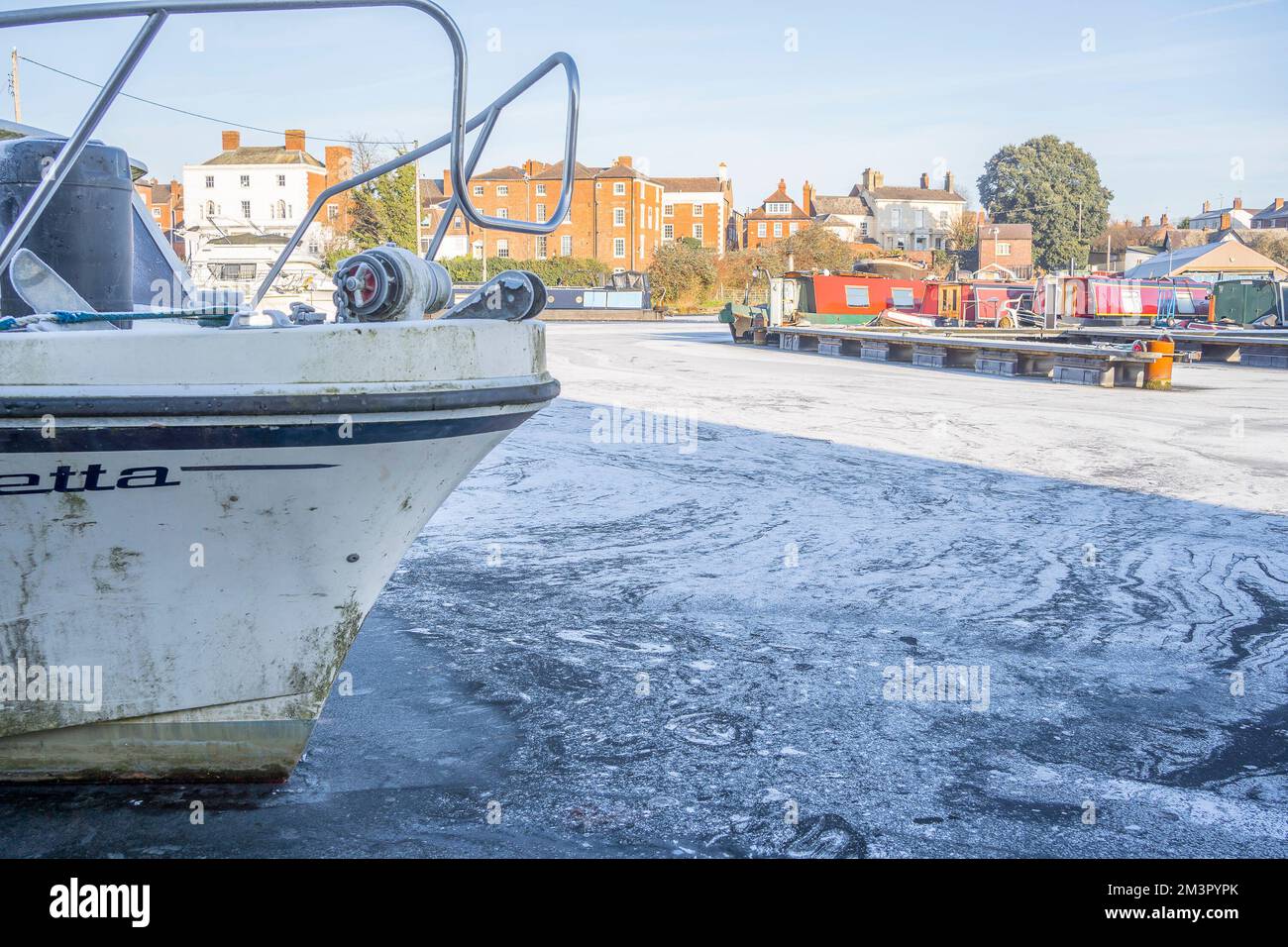 Stourport-on-Severn, UK. 16th December, 2022. UK weather: ice everywhere as freezing conditions persist in the Midlands. Water in the basin marina is frozen solid in Stourport-on-Severn and these Worcestershire boats are going nowhere today! Credit: Lee Hudson/Alamy Live News Stock Photo