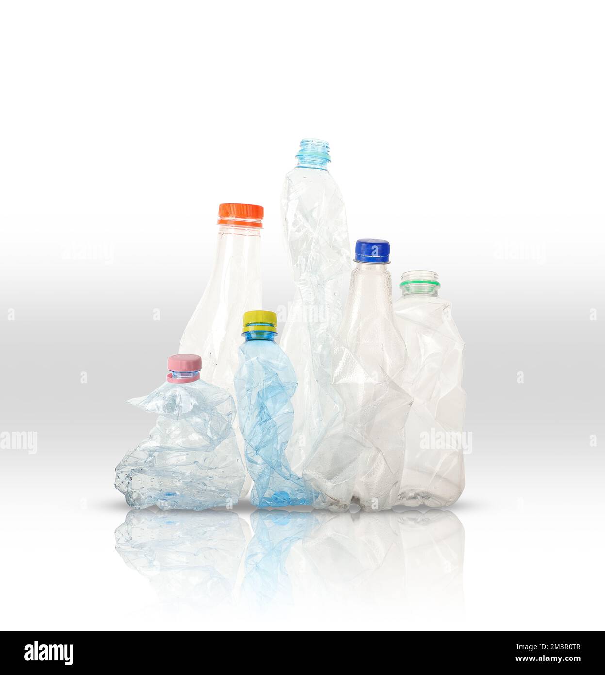 Crumpled plastic water bottles on white background Stock Photo