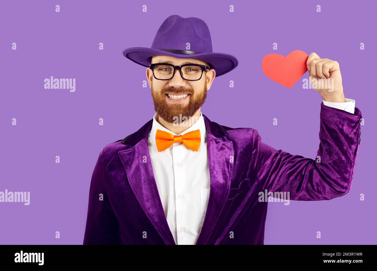 Portrait of happy man in costume show heart sign Stock Photo