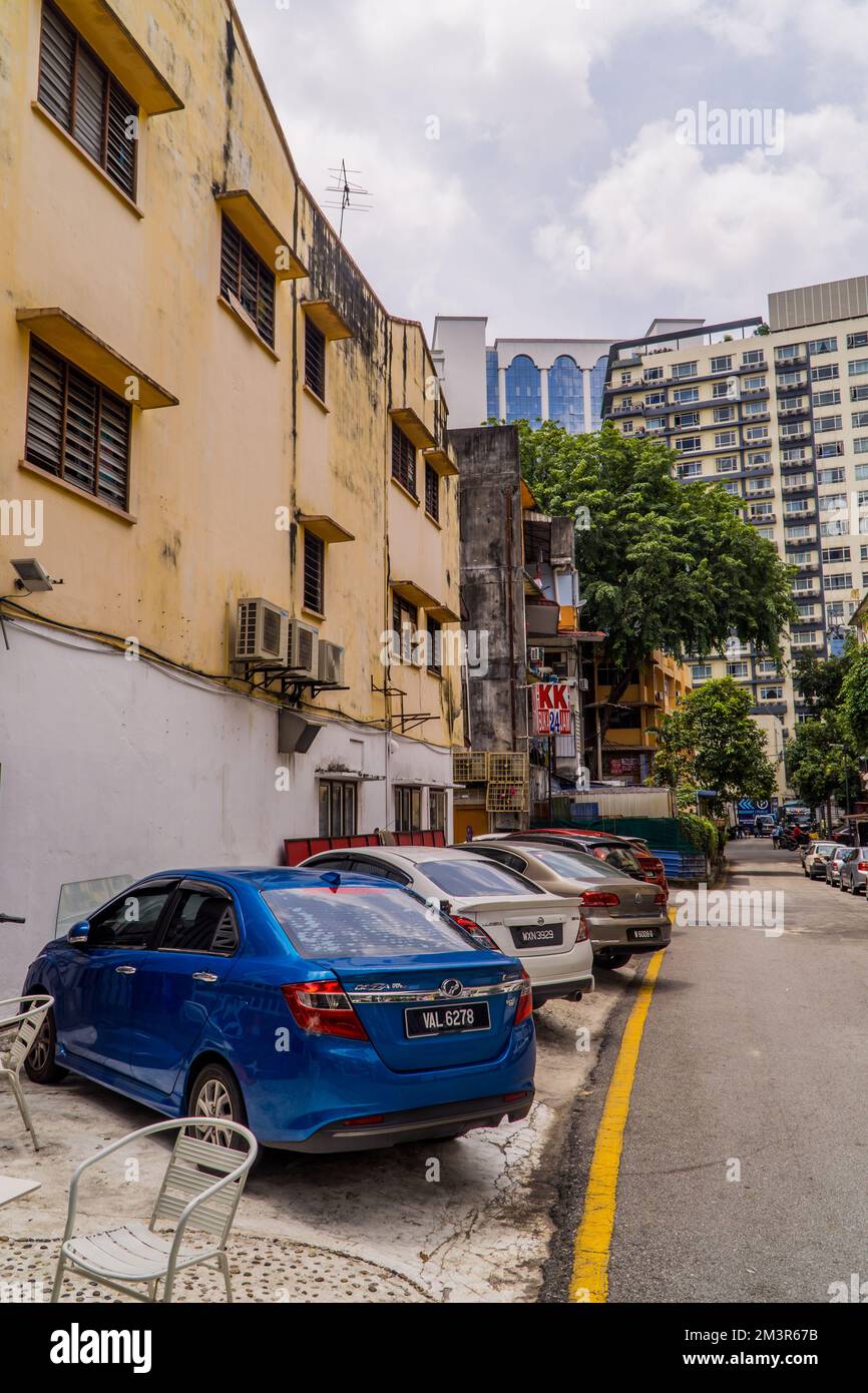 A vertical of old apartments and new buildings near Bukit Bintang