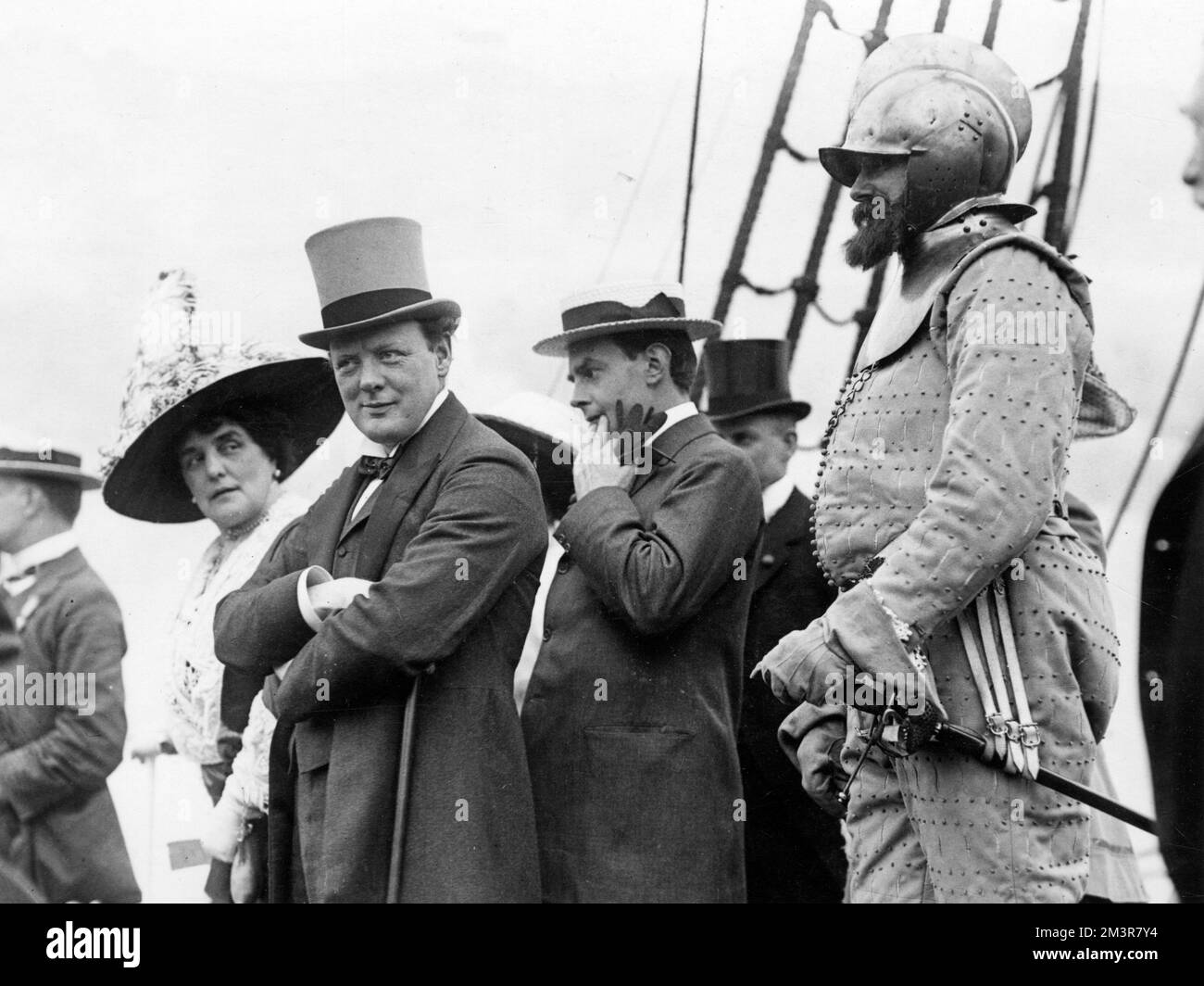 Winston Churchill at the 'Shakespeare's England' exhibition at Earls Court, west London in 1912. He is seen here on board a replica of the Elizabethan ship 'Revenge'.     Date: 1912 Stock Photo