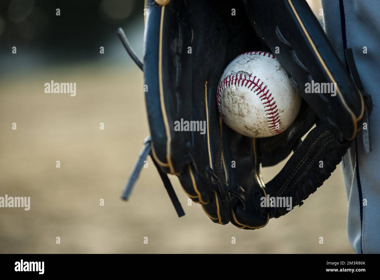 Close up baseball held glove Stock Photo