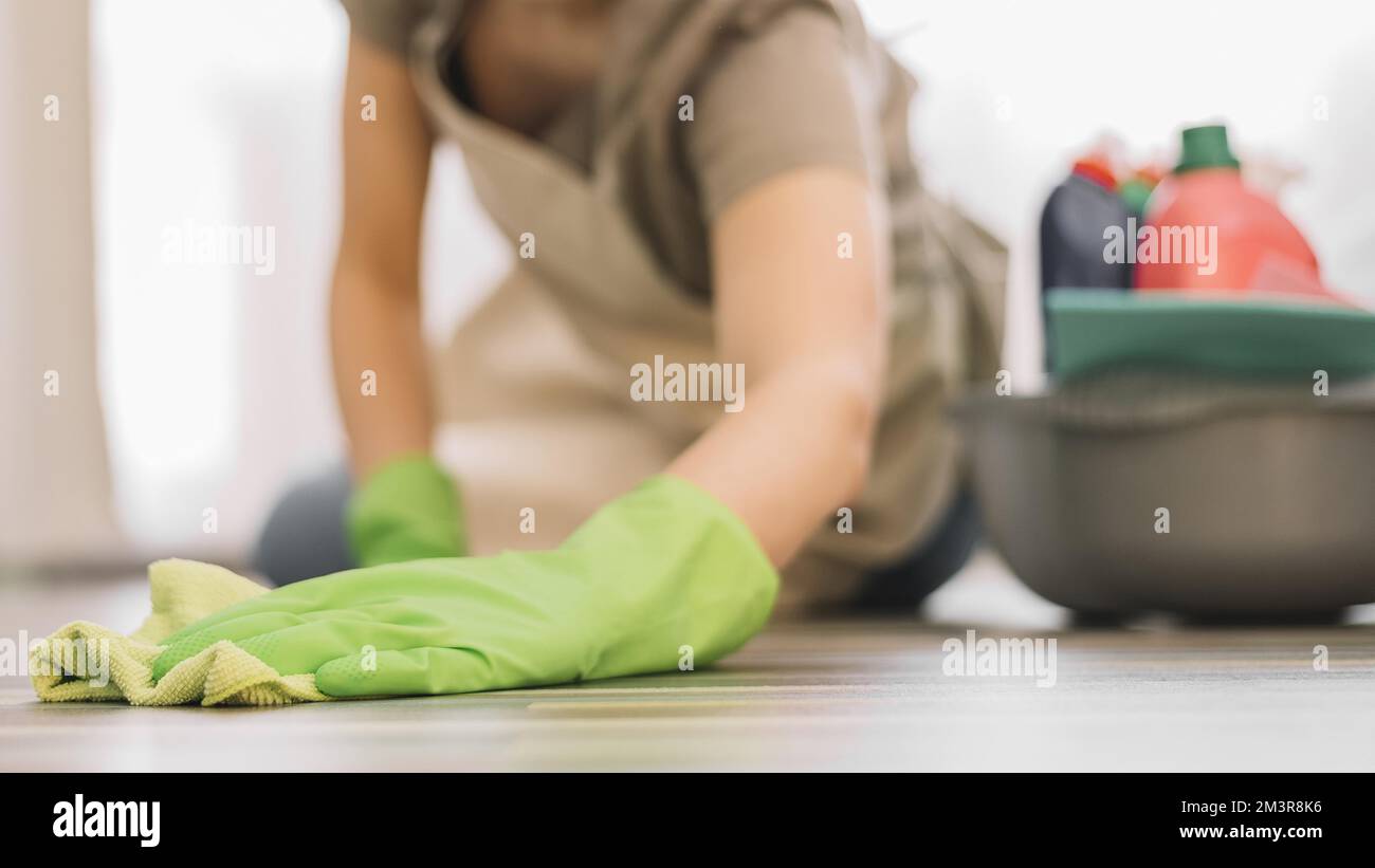 Close up woman cleaning floor hi-res stock photography and images - Alamy