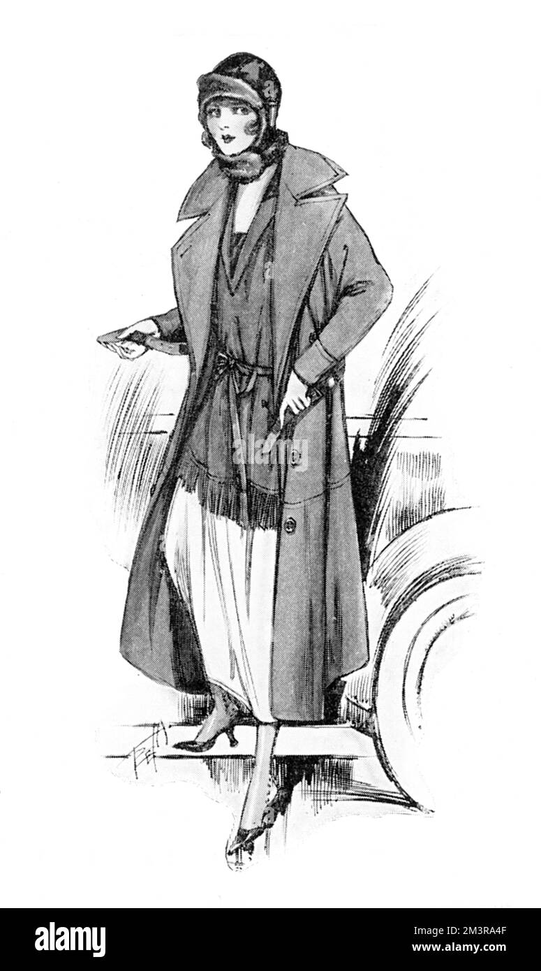 An outfit for a lady motorist comprising a leather jumper of a dark penguin grey shade broken by touches of crimson velvet worn with a grey suede double breasted coat, all completed with a becoming Dutch leather bonnet.  Dunhill also had other motoring accessories available including gloves and could make bespoke car mascots for customers.     Date: 1919 Stock Photo