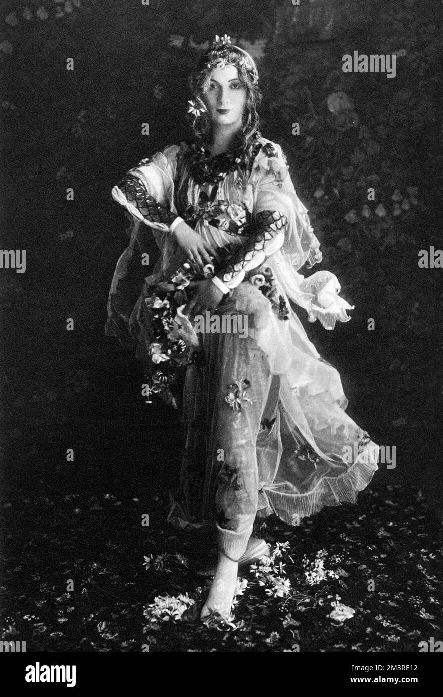 Hazel Lavery, wife of the painter Sir John Lavery, pictured as La Prima Vera by Botticelli at the Picture Ball, held at the Albert Hall in aid of the Invalid Kitchens of London The ball paid homage to all styles of painting from the past from Egyptian and Etruscan up to the Modernists with a succession of highly accurate representations made by members of high society.      Date: 1913 Stock Photo